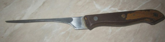Фото ножа после пары десятков заточек на элекстрическом станке